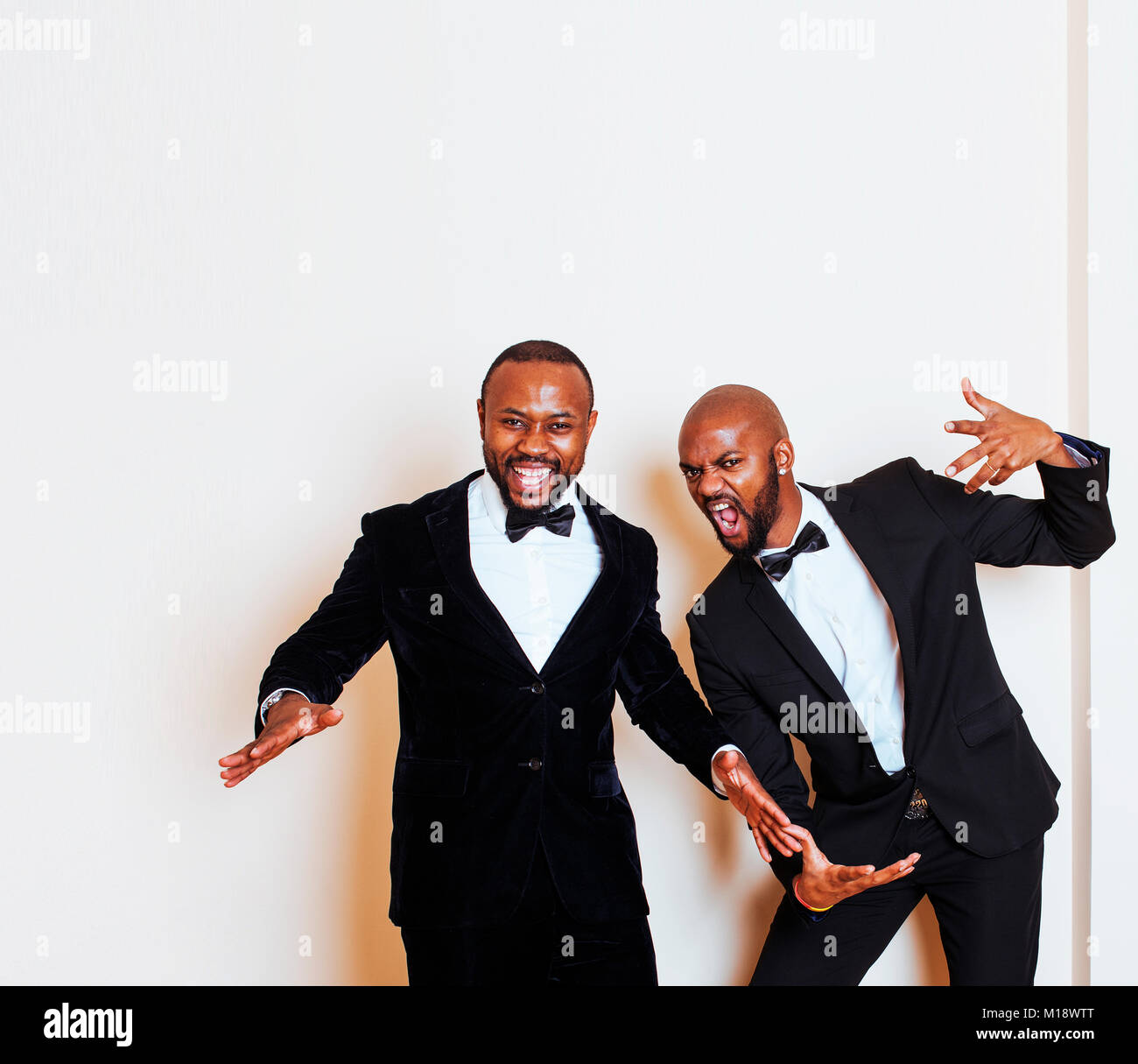 two afro-american businessmen in black suits emotional posing, g Stock ...