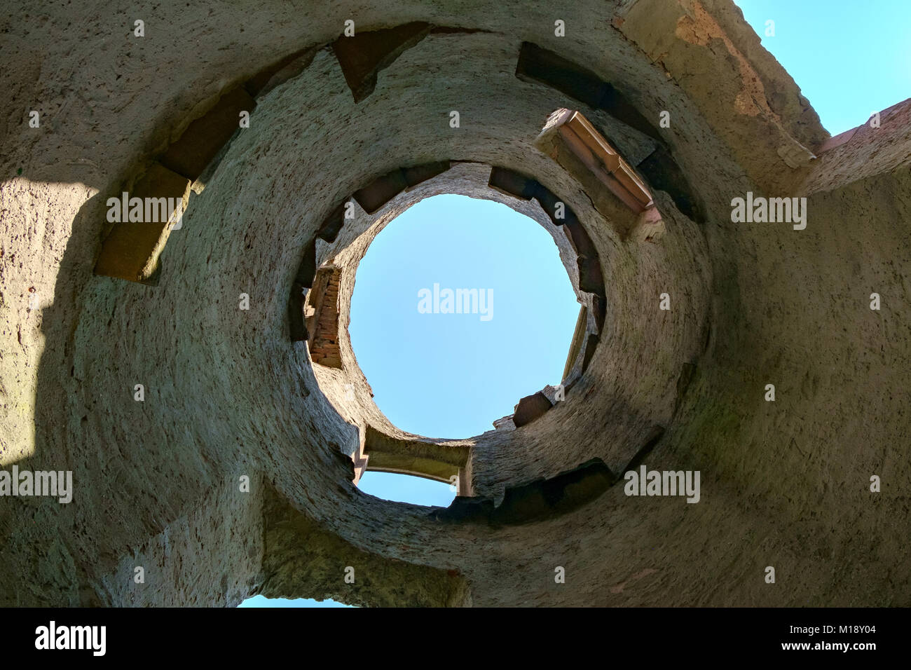 Inside the hollowed-out shell of a tower at the Madenburg castle ruin ...