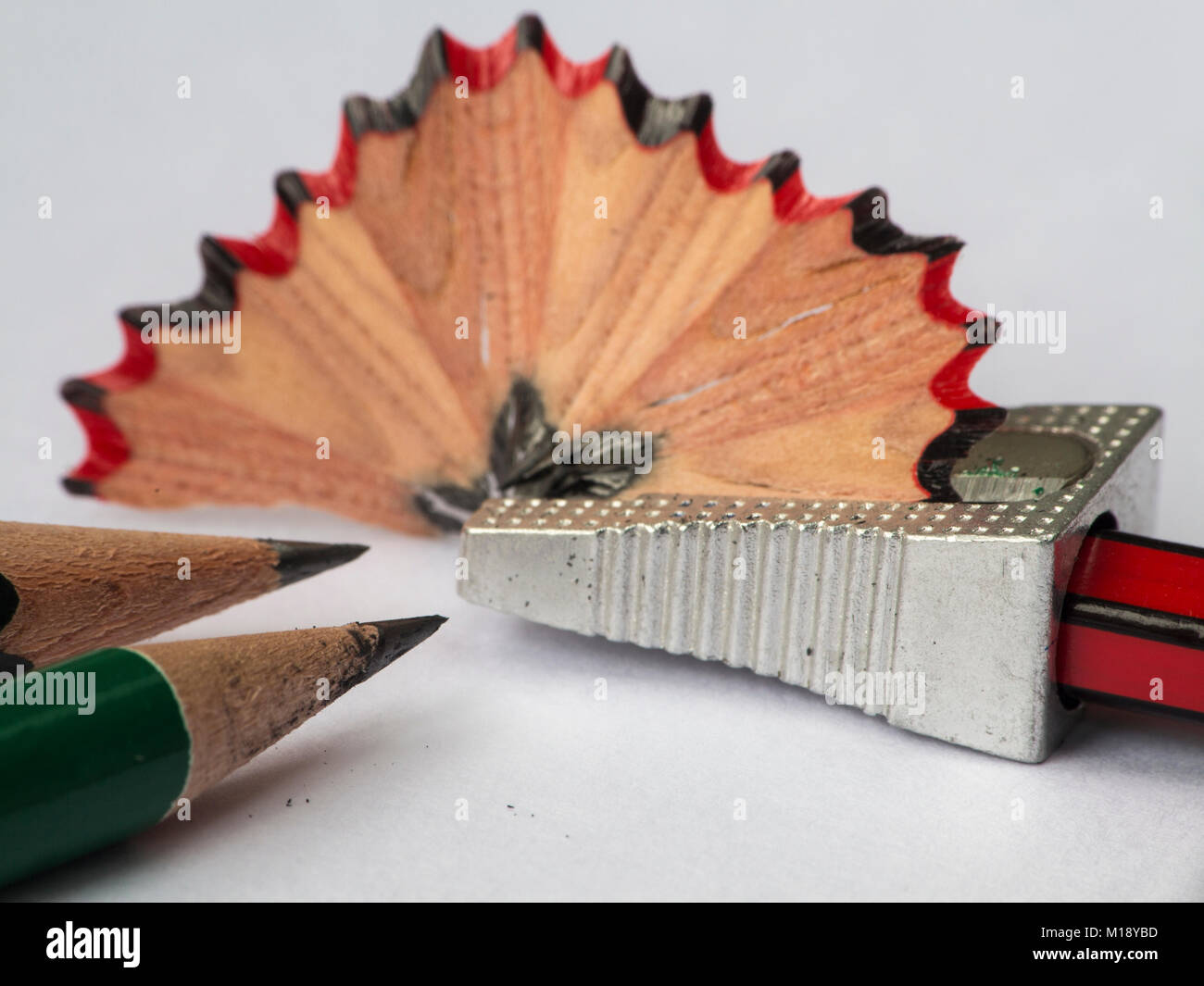 A pencil sharper and sharpened pencils Stock Photo Alamy