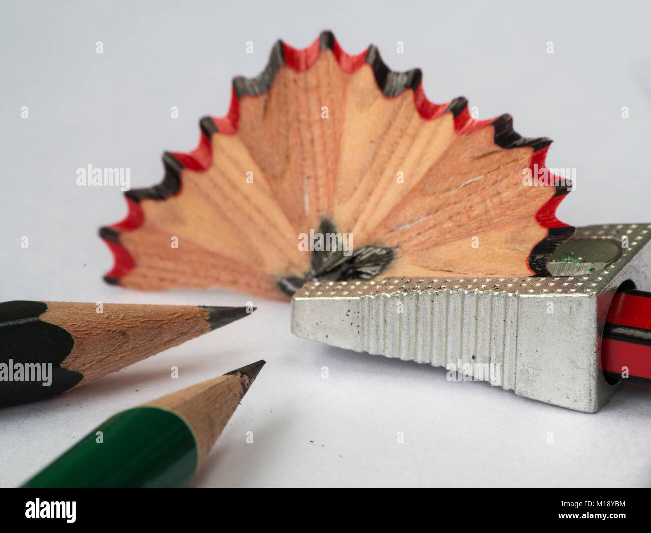 A pencil sharper and sharpened pencils Stock Photo Alamy
