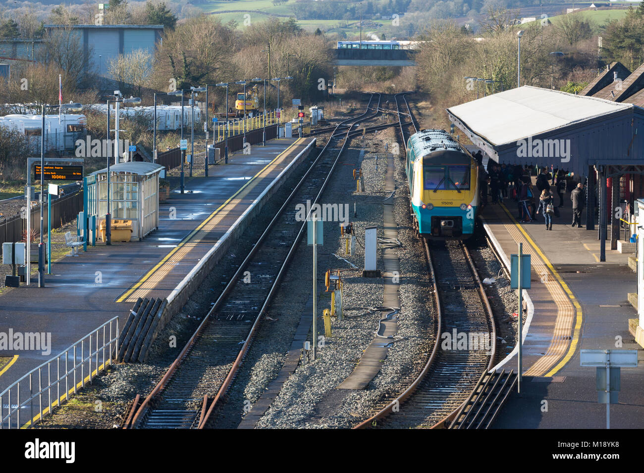 Carmarthen railway station with train at platform Stock Photo