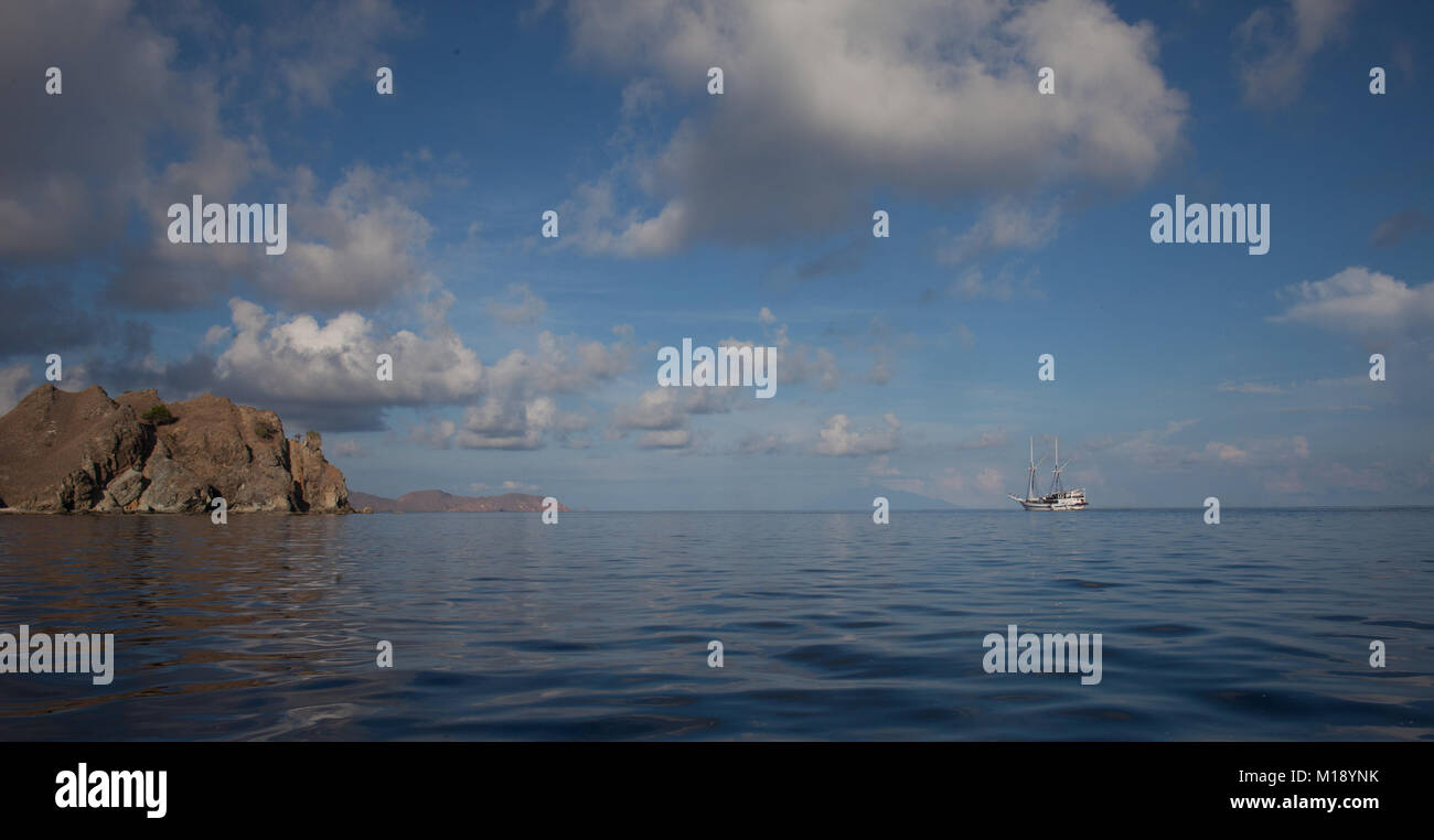 Cloudy blue sky over the ocean in panorama landscape Stock Photo - Alamy