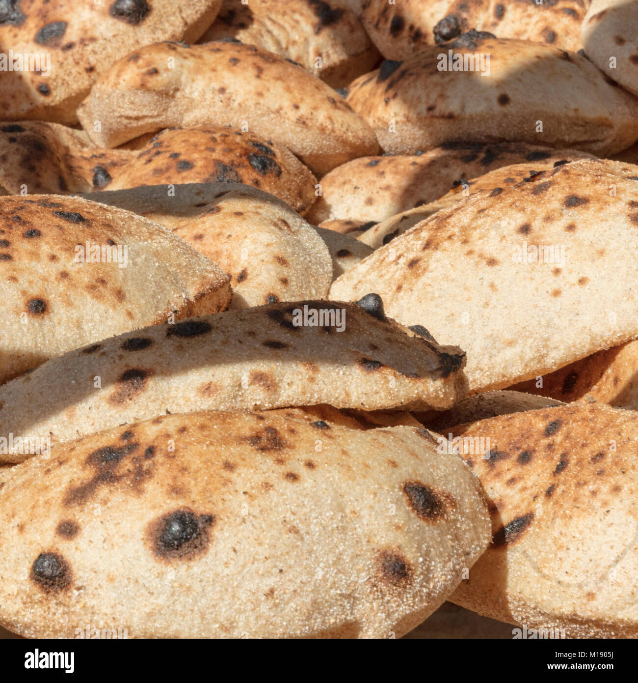 Egyptian Whole Grain Pita Bread For Sale in the Aswan Souq Stock Photo