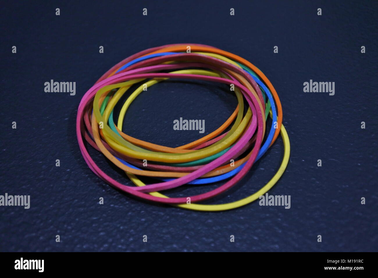 A collection of rubber bands with different colors. Stock Photo