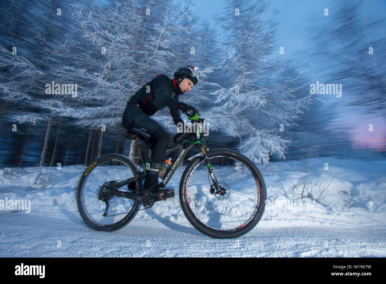 Rider at the Strathpuffer 24 hour mountain bike race in Strathpeffer in the Scottish Highlands. Stock Photo