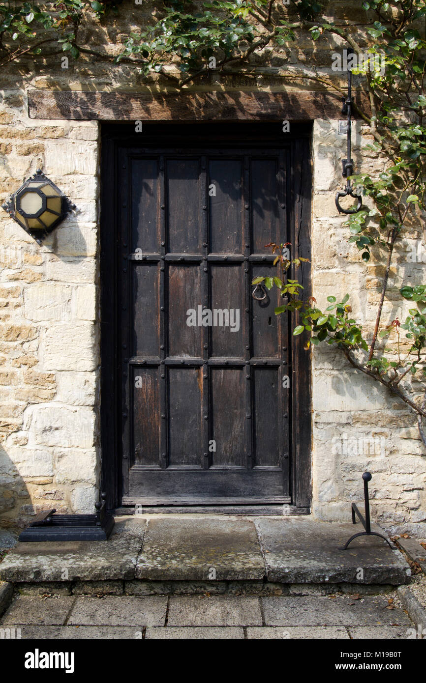 Old studded wooden front door hi-res stock photography and images - Alamy