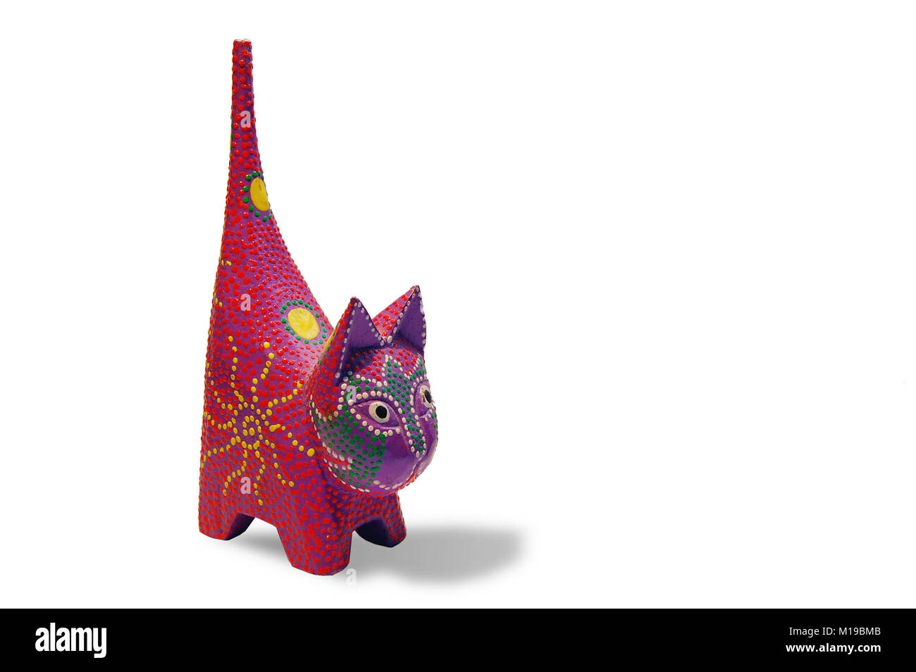 colorful wooden cat on white background Stock Photo - Alamy
