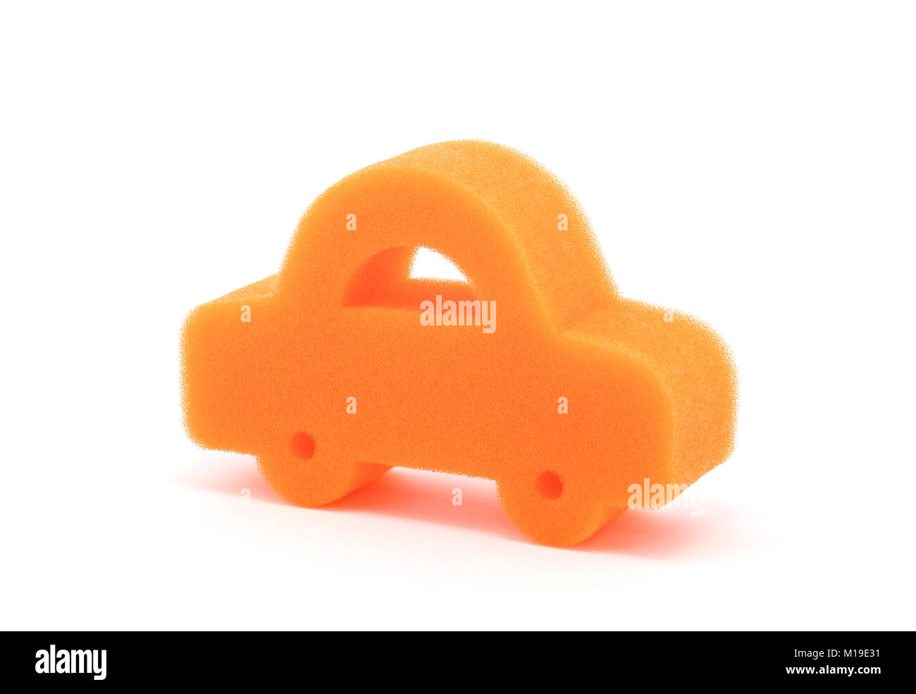 Orange car shape sponge on white background Stock Photo Alamy