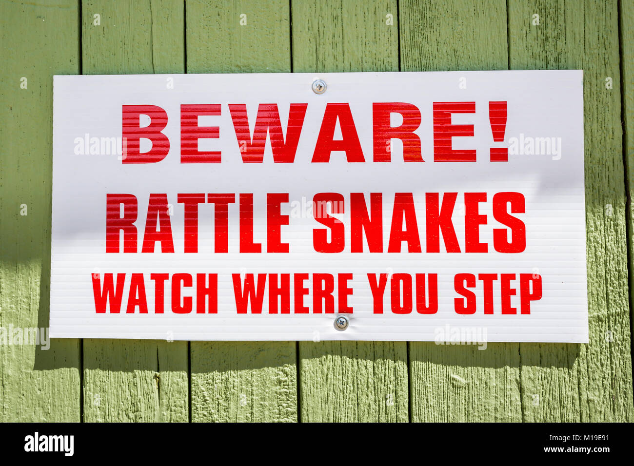 Rattle snake warning sign, Shaniko, Wasco County, Oregon, United States Stock Photo