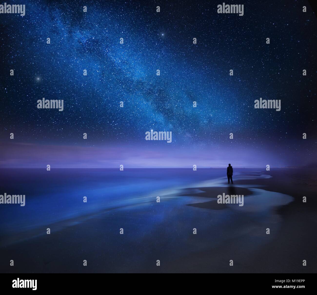 Starry Night Sky Over Sea And Beach With Man Silhouette Man Standing Stock Photo Alamy Starry Night Sky Over Sea And Beach With Man Silhouette Man Standing Stock Photo Alamy