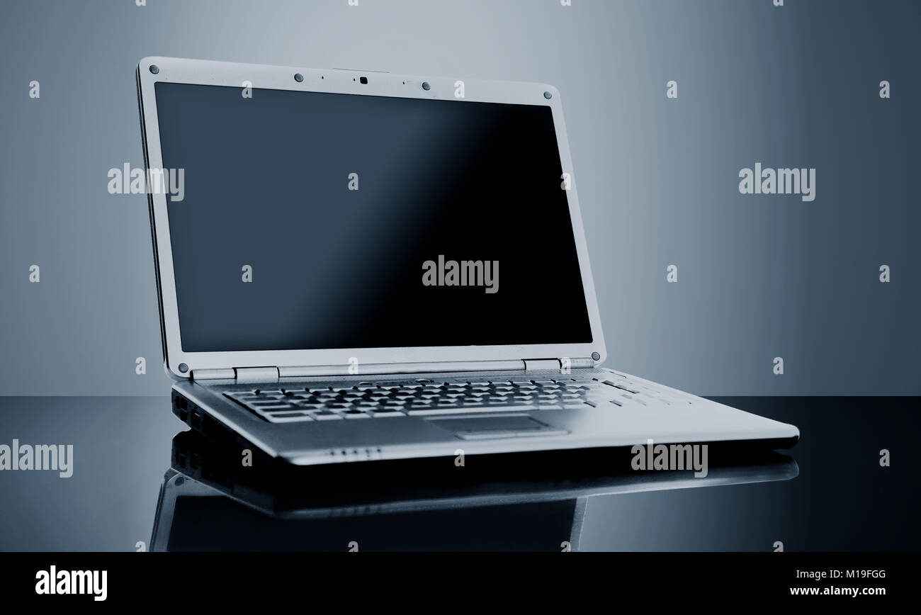 Modern laptop isolated on black background Stock Photo - Alamy