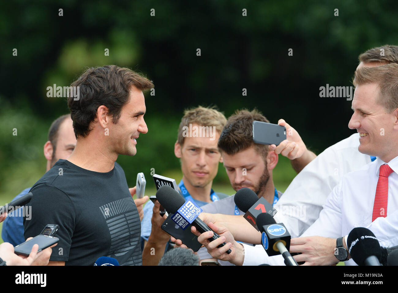 Melbourne, Australia. 29th Jan, 2018. The 2018 Australian Open champion Roger Federer of Switzerland speaks to the media after posing for photographs with his trophy at Government House in Melbourne, Australia. Federer beat Cilic 3 sets to 2. Sydney Low/Cal Sport Media/Alamy Live News Stock Photo