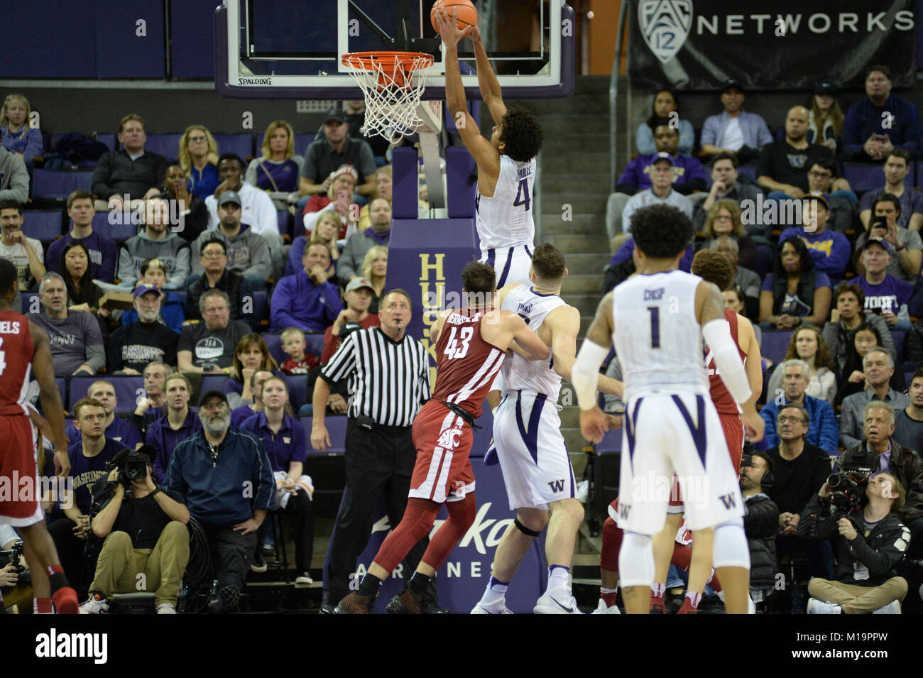 Seattle, WA, USA. 28th Jan, 2018. Matisse Thybulle (4) dunks for two of his 18 points during a PAC12 basketball game between the Washington Huskies and WSU Cougars. Washington won the game 80-62. The game was played at Hec Ed Pavilion in Seattle, WA. Jeff Halstead/CSM/Alamy Live News Stock Photo