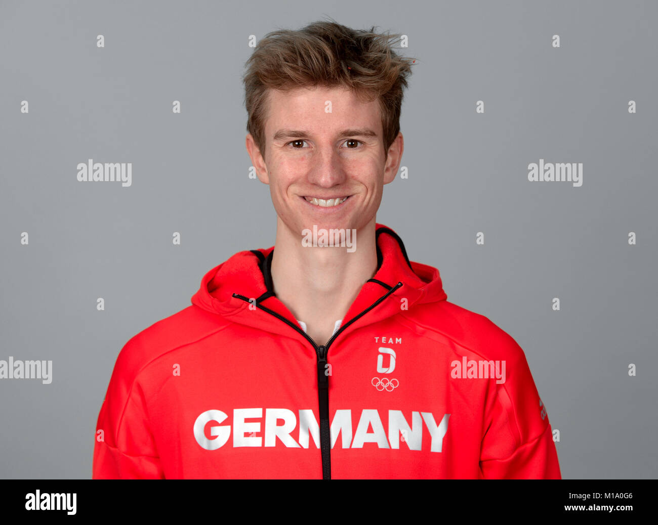 Ski jumper Karl Geiger poses at a photocall during the preparations for