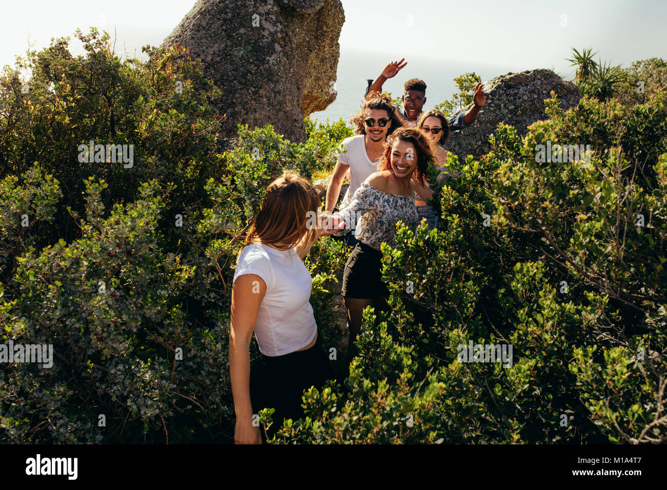 Group of people walking uphill hi-res stock photography and images - Alamy