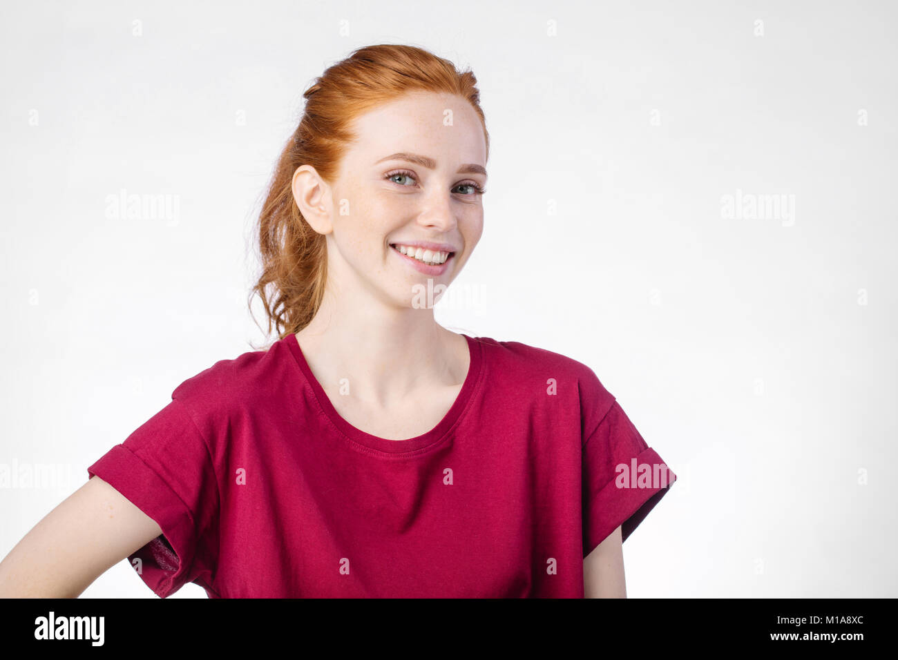 smiling woman posing isolated on white background Stock Photo - Alamy