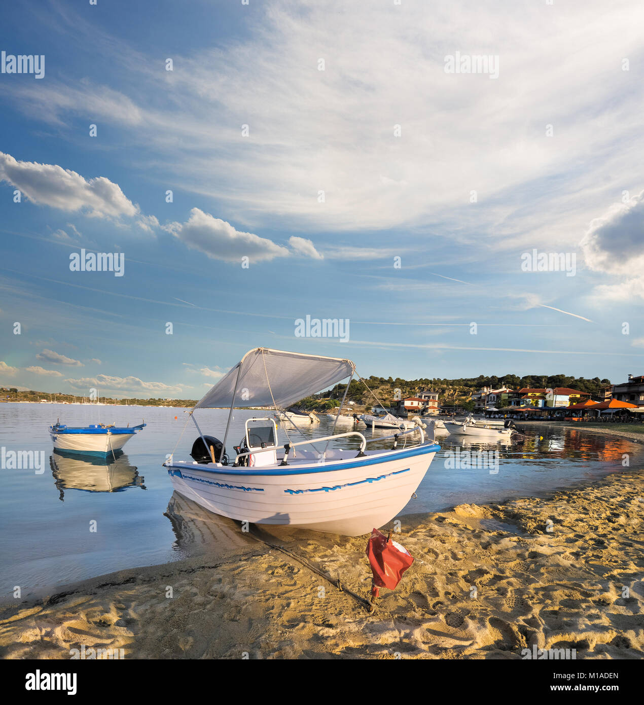 Touristic motor boat by the shore in Ormos Panagias, Sithonia, Northern Greece Stock Photo