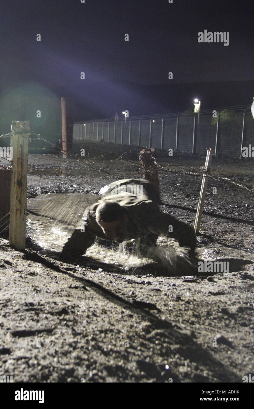 Nobody said this will be easy and competitors realized that instantly during the California Army National Guard’s 2015 Best Warrior Competition Nov. 16-20 at Camp San Luis Obispo, San Luis Obispo, California. (U.S. Army National Guard photo/Staff Sgt. Eddie Siguenza) Stock Photo