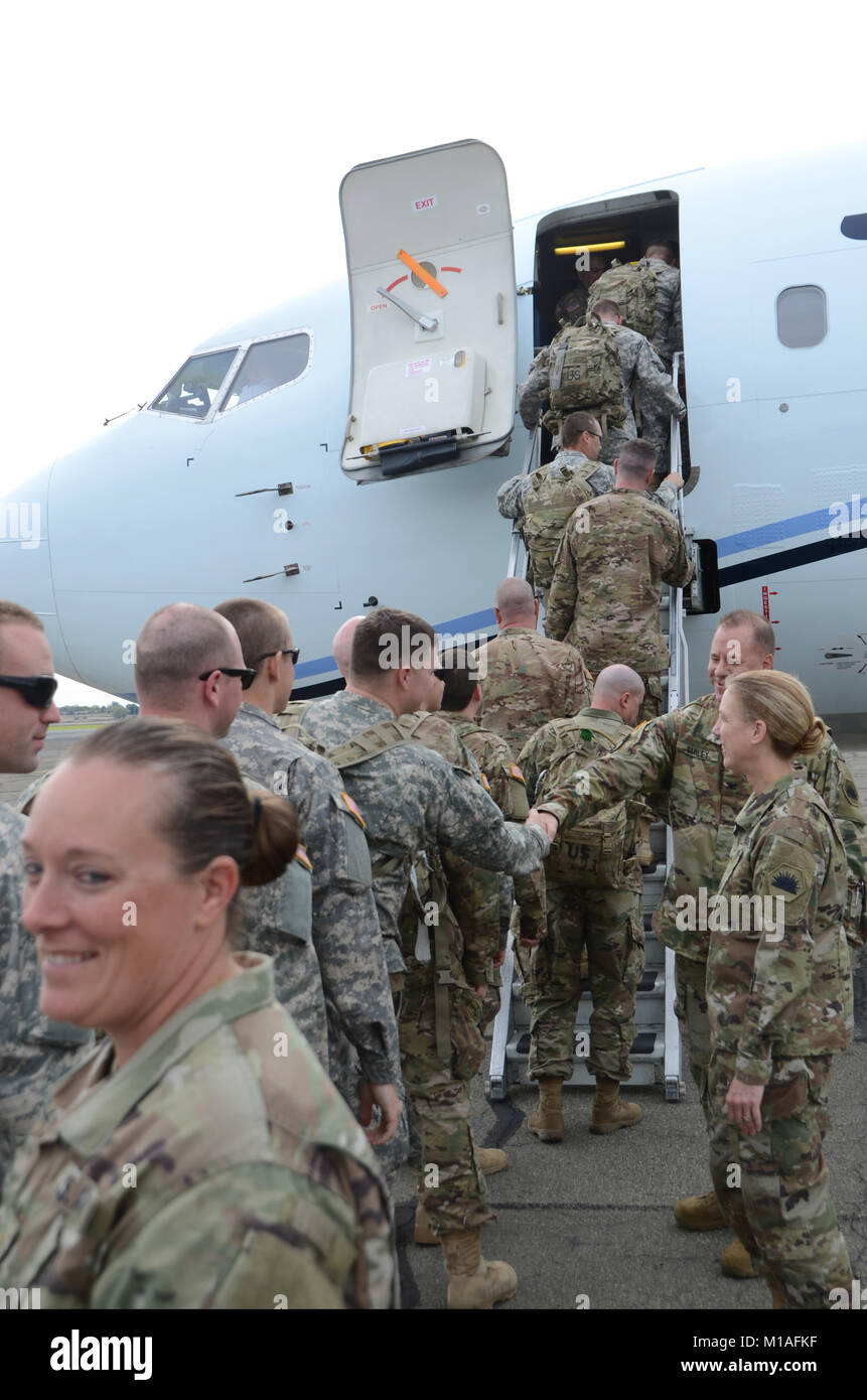 California Army National Guard Soldiers from the 649th Engineer Co. arrive at the Mather Flight Facility, Nov. 6, 2016, to head to their premobilization training station, on their way to a Middle East deployment where they plan to work on infrastructure improvements like airfields and roads and also projects like force protection structures. (U.S. Army National Guard photo by Army Staff Sgt. Rafael H. Rodriguez Jr., Released) Stock Photo