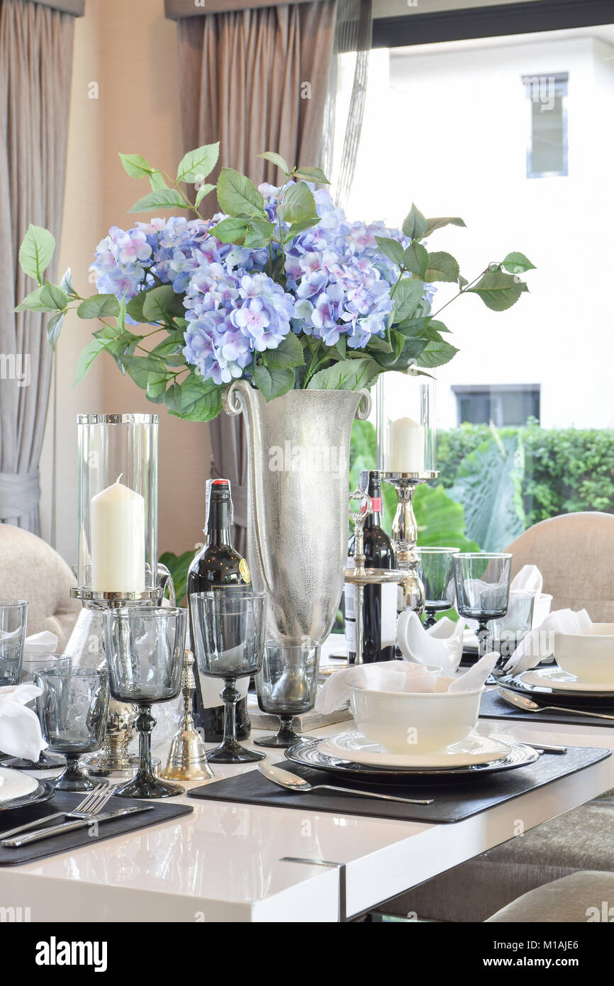 elegant table set on marble dining table in modern style dining room ...
