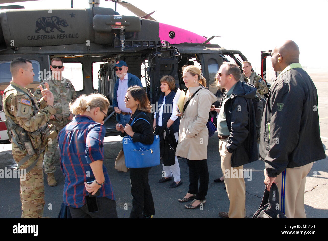 The California National Guard's Adjutant General Maj. Gen. David S. Baldwin joined Gov. Jerry Brown, U.S. Sen. Diane Feinstein, and U.S. Sen. Kamala Harris for an air and ground survey of Northern California fires in and around Santa Rosa, California, Oct. 14, 2017. Joining them in assessing the damage and addressing the community were CAL FIRE Director Chief Ken Pimlott, California Office of Emergency Services Director Mark Ghilarducci, and representatives from the California Highway Patrol, the U.S. Forest Service, and local and regional emergency-response agencies (Army National Guard photo Stock Photo