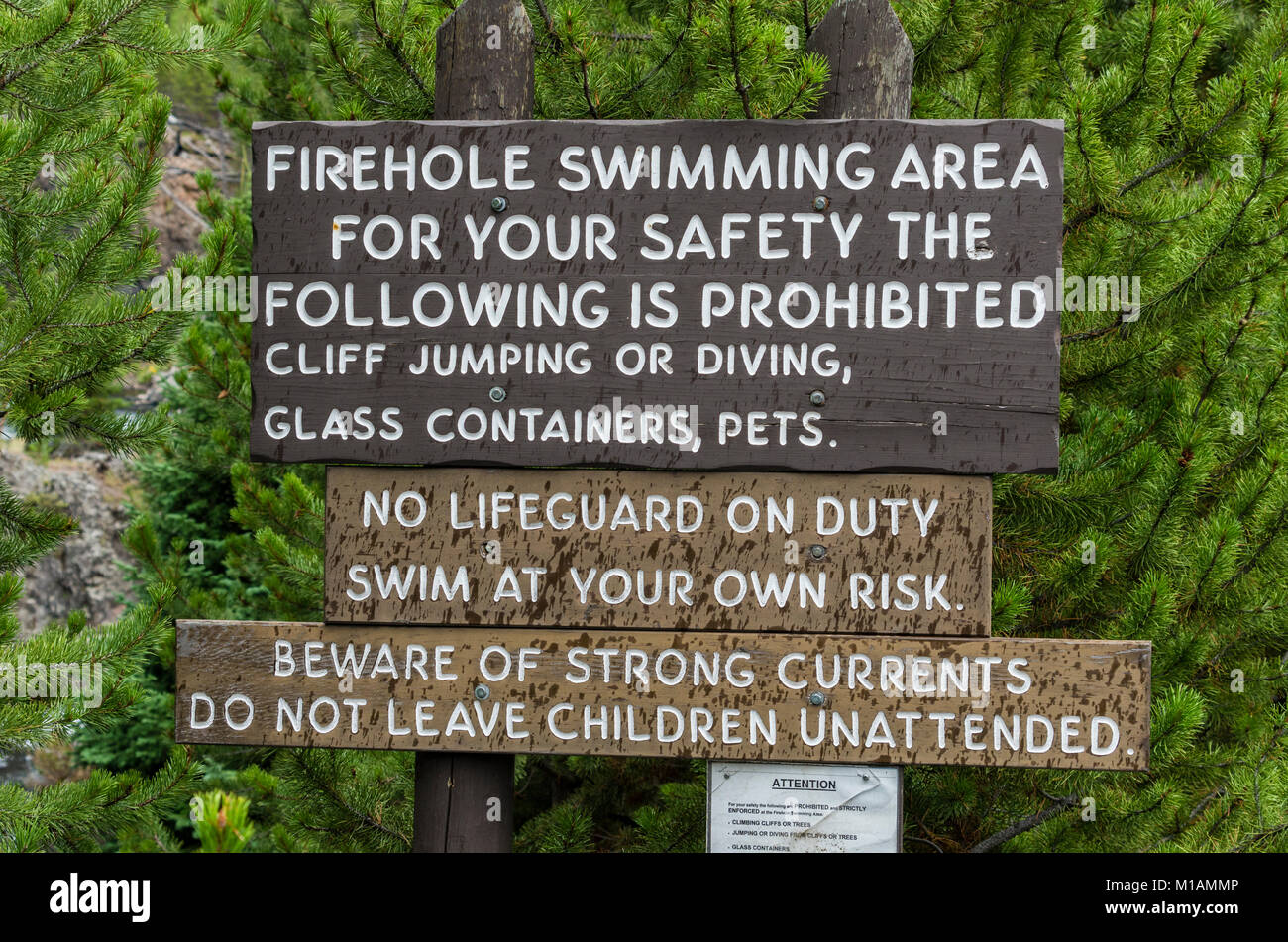 Warning sign at the Firehole River swimming area. Yellowstone National Park, Wyoming USA Stock Photo