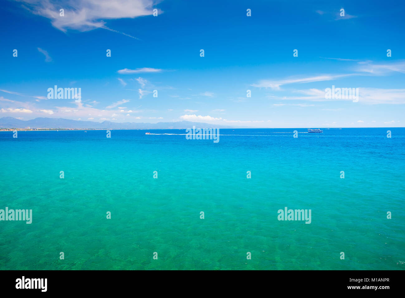 Summer sea background. Emerald sea and clear blue sky. Stock Photo