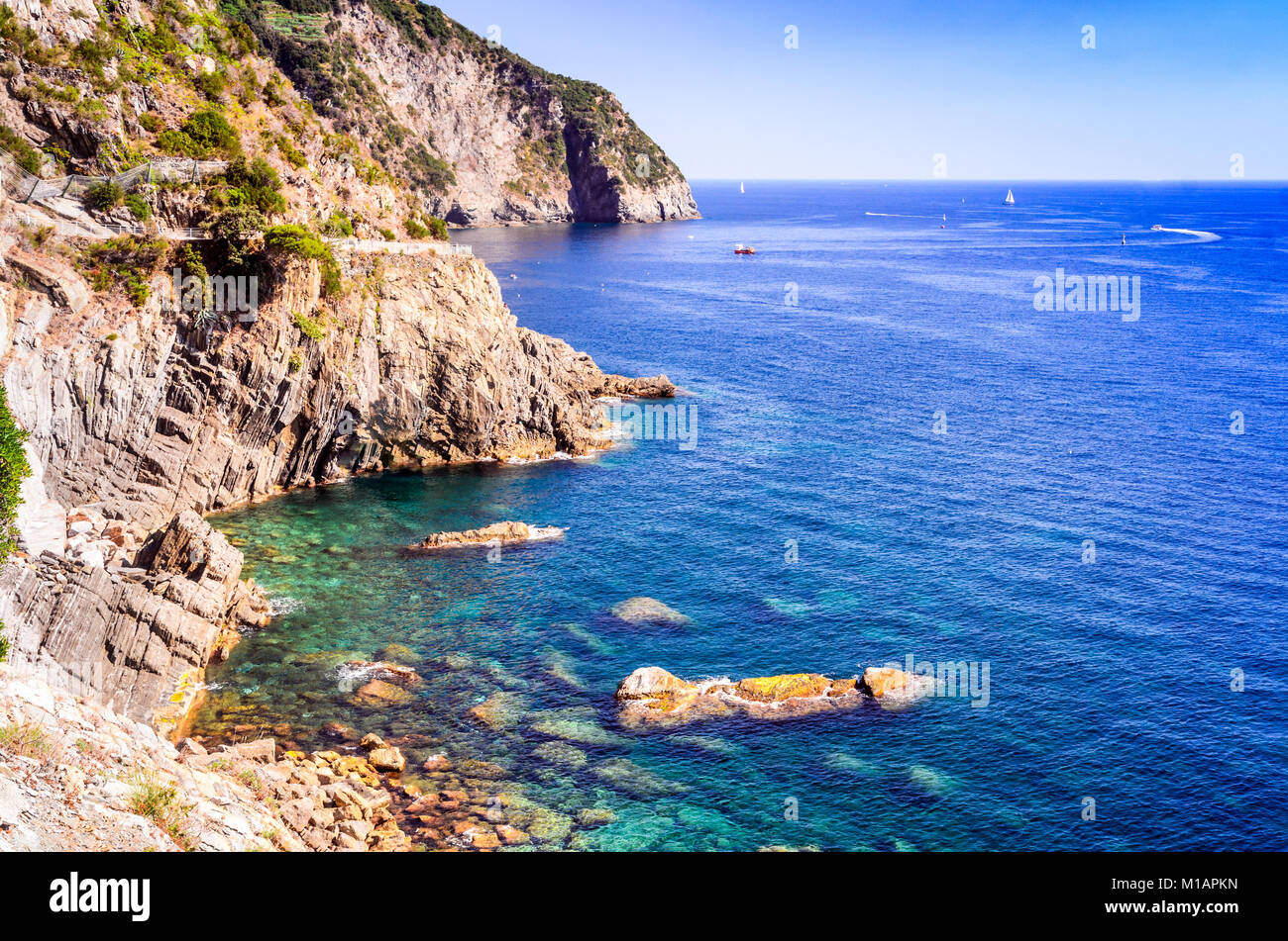 Cinque Terre, Italy. Rocky coastline of Mediterranean Sea at province La Spezia, holiday place in Liguria. Stock Photo