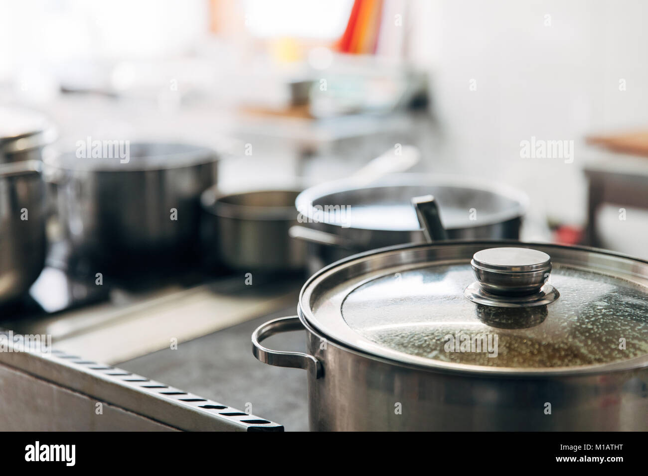 close-up shot of sauce pans at restaurant kitchen Stock Photo