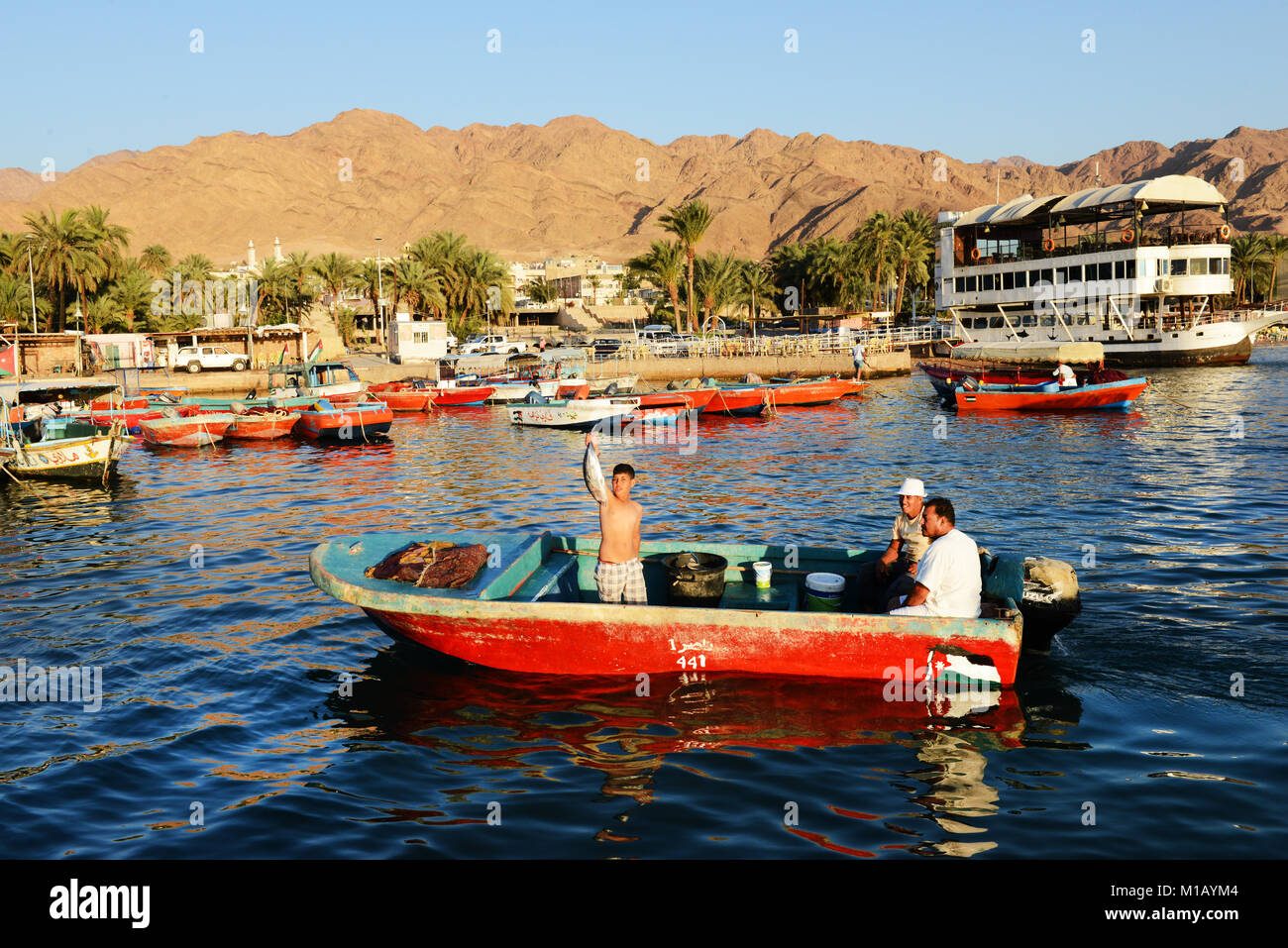 Small fishing boats in Aqaba, Jordan Stock Photo - Alamy