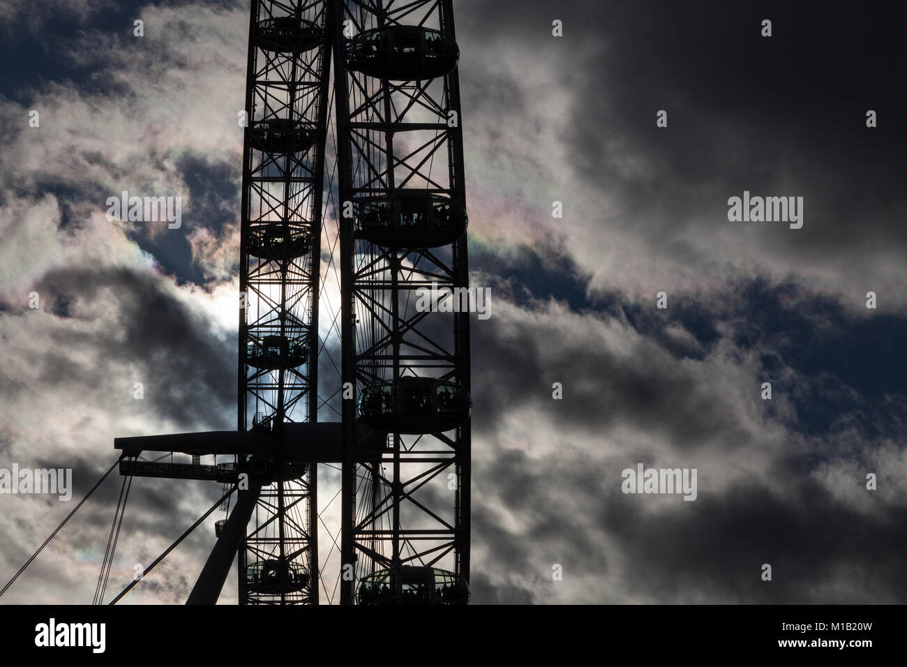 Silhouette of the London Eye in cloudy weather. Westminster, London, UK Stock Photo