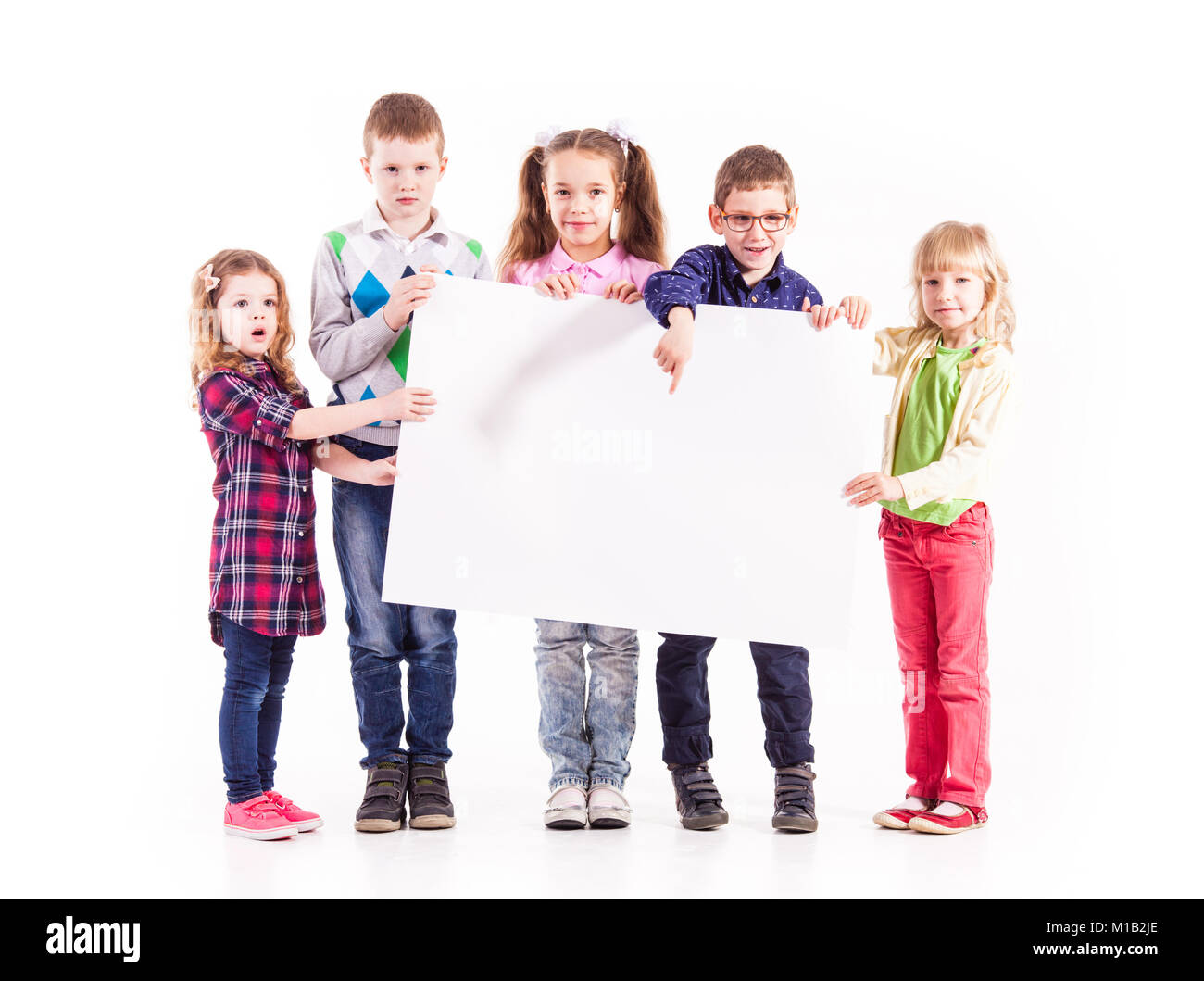 The kids are holding a white blank Stock Photo - Alamy
