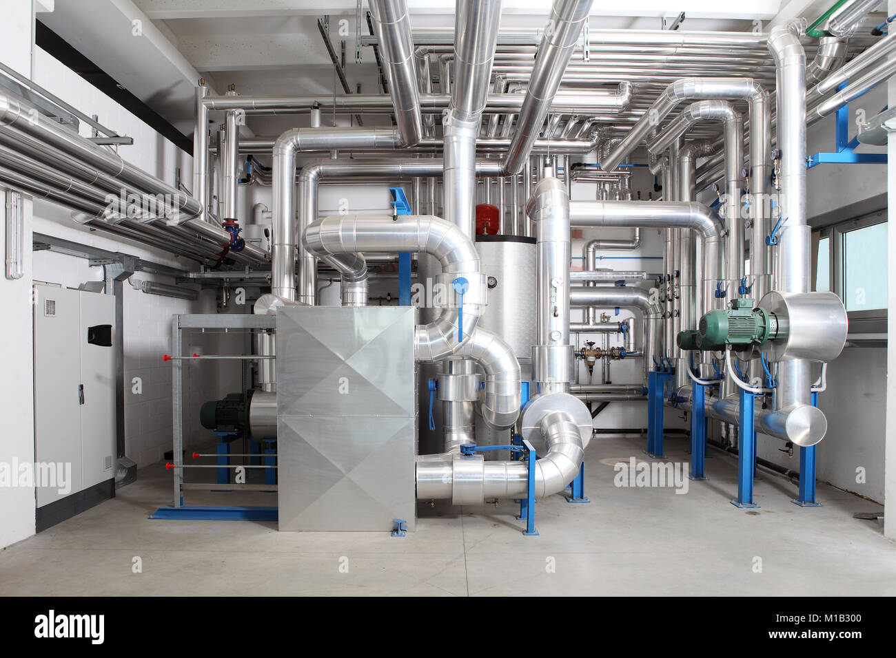 central heating and cooling system control in a boiler room Stock Photo