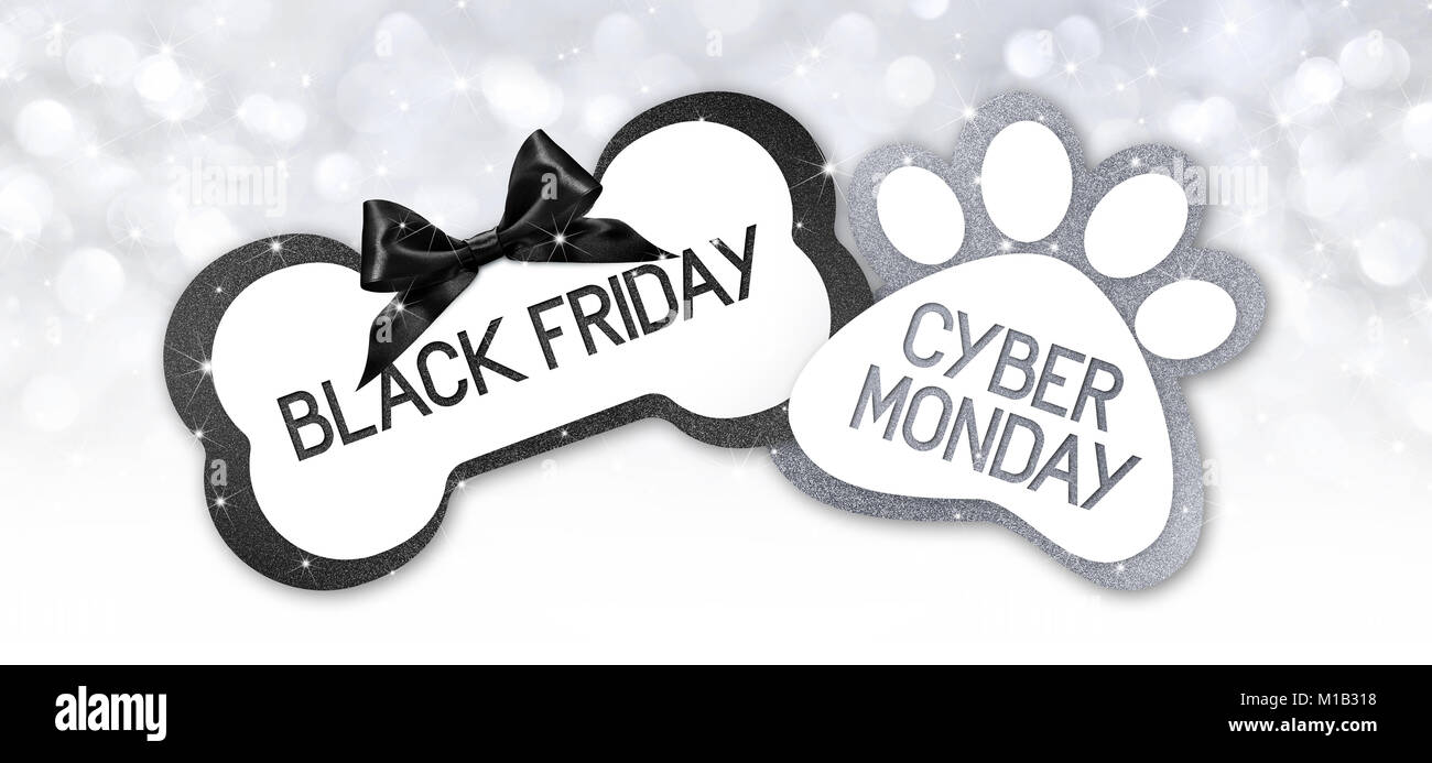 pet shop black friday and cyberg monday sale text write on gift card label with black ribbon bow on silver bright lights background Stock Photo