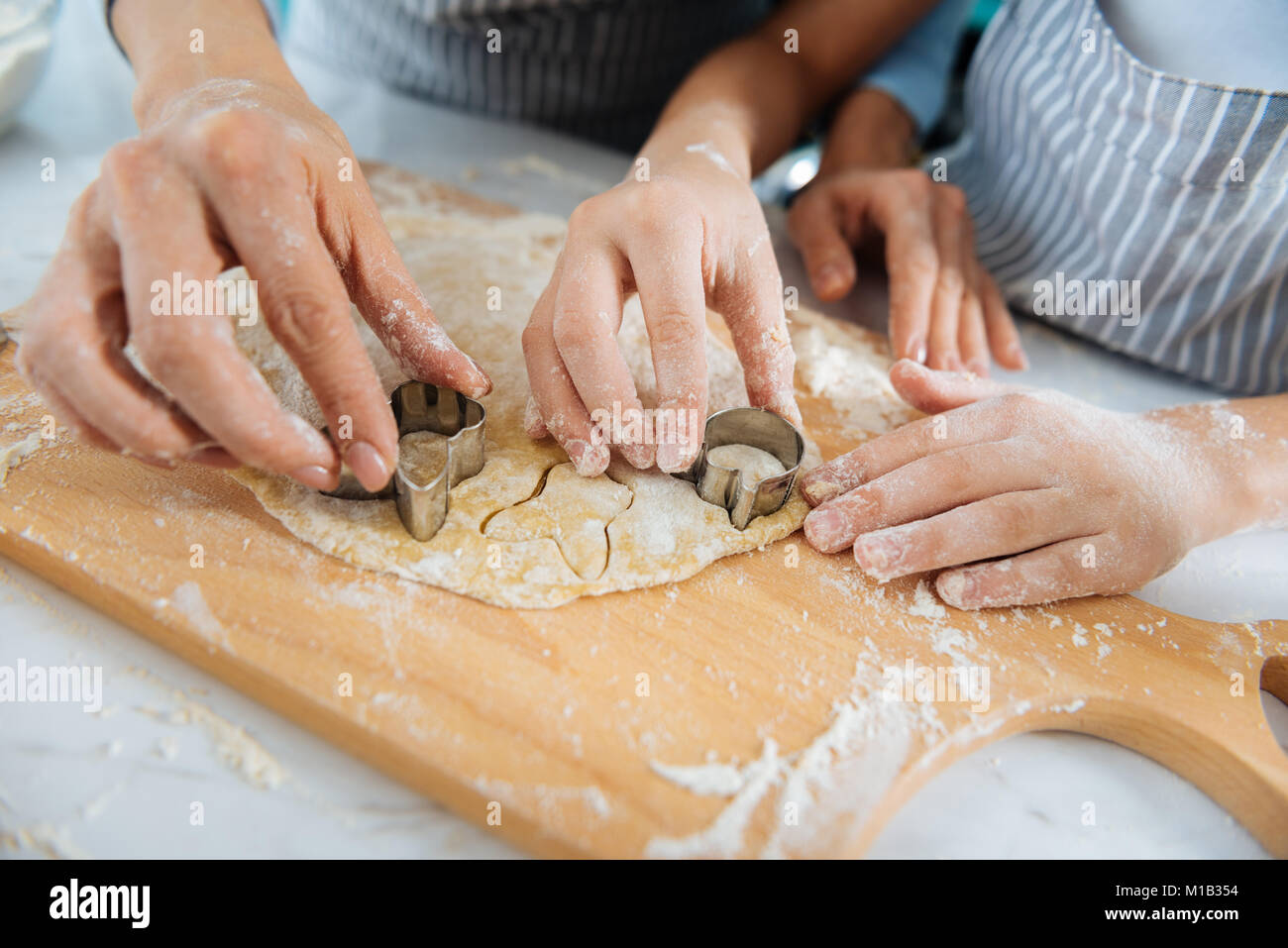 Mother and daughter using nice molds for cookies Stock Photo Alamy