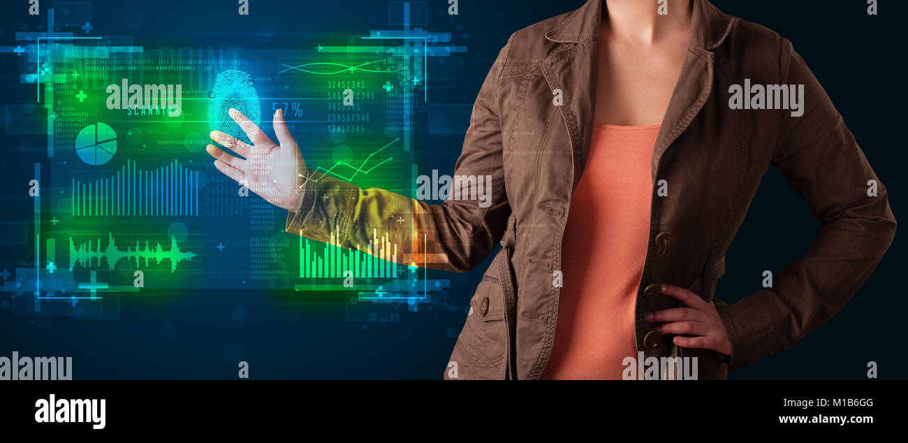 Businesswoman pressing modern technology panel with finger print reader Stock Photo