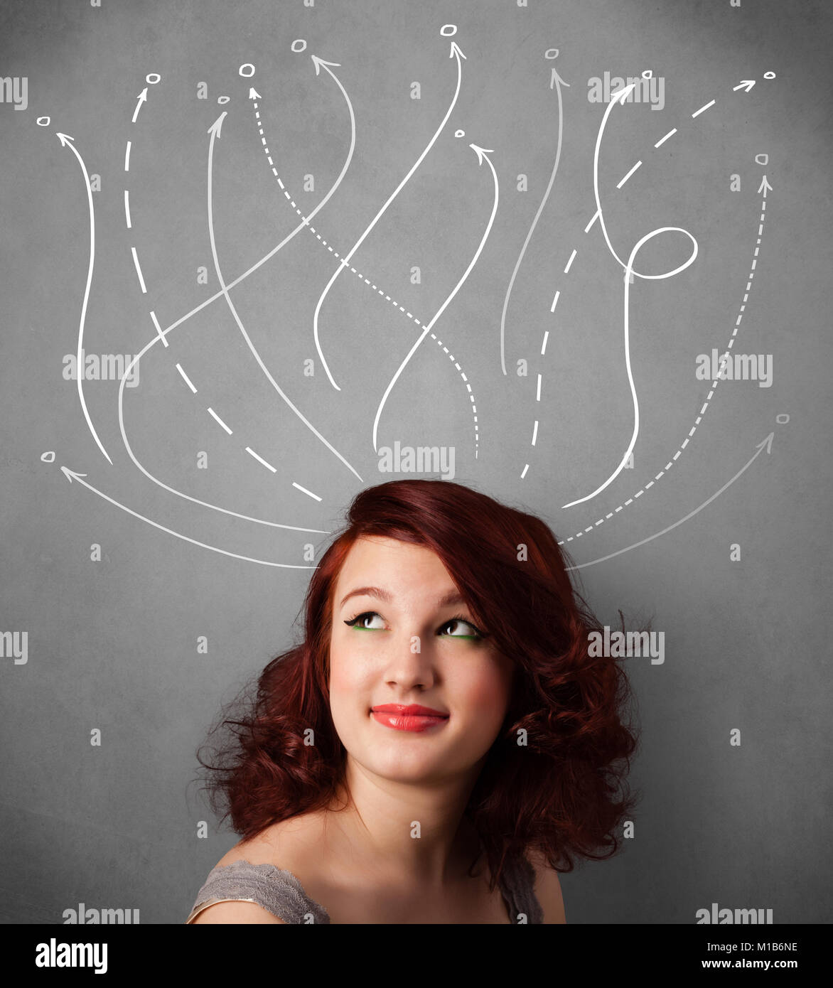 Pretty young woman thinking with arrows in different directions above ...