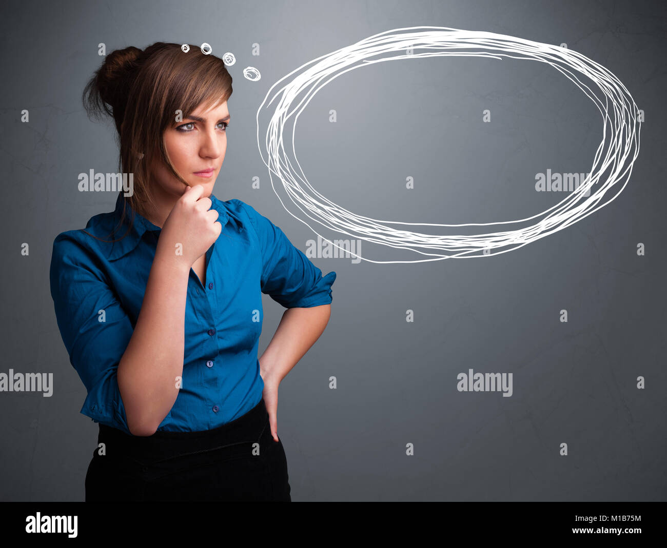 Beautiful young lady thinking about speech or thought bubble with copy space Stock Photo