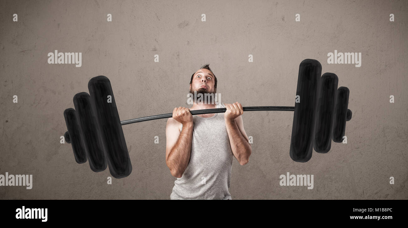 Funny skinny guy lifting incredible weights Stock Photo Alamy