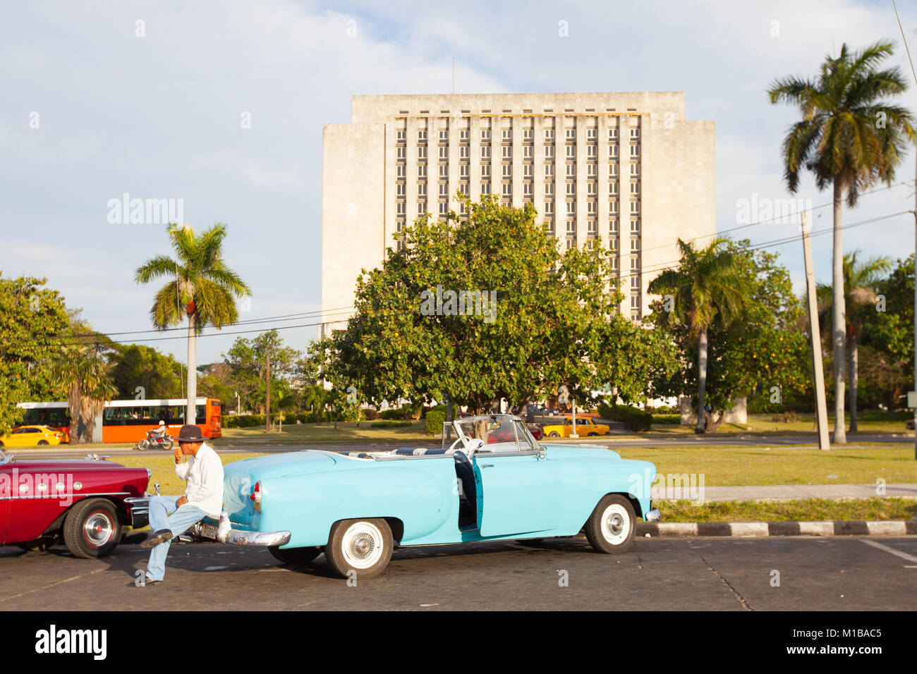 Driver relaxing at Plaza de la Revolucion Stock Photo Alamy
