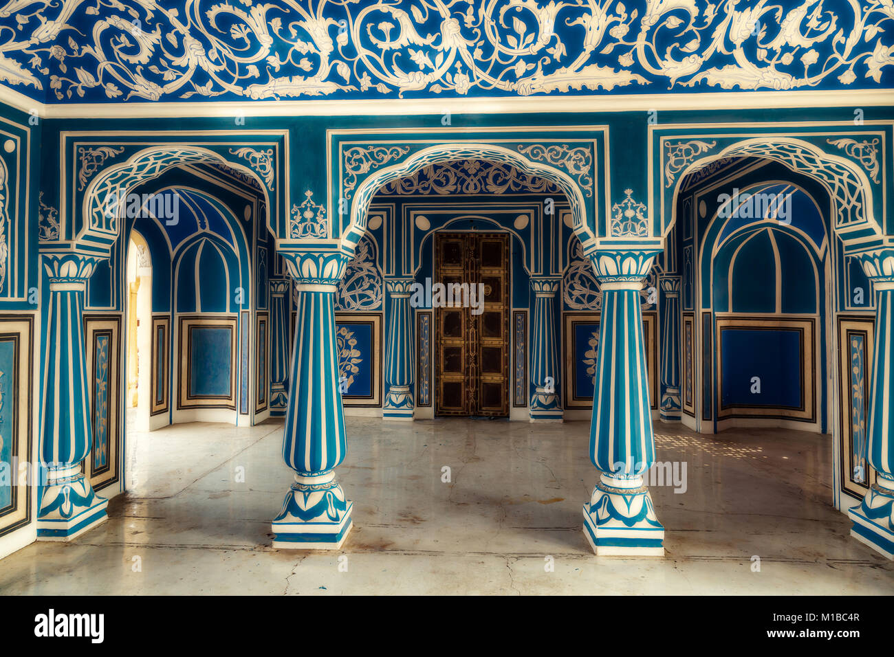 City Palace Jaipur Rajasthan. View of Royal palace hallway with wall art  paintings and floral patterns Stock Photo - Alamy