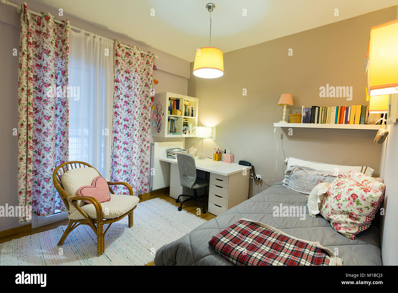 Cozy Interior Bedroom Of A Young Woman With White Laminate
