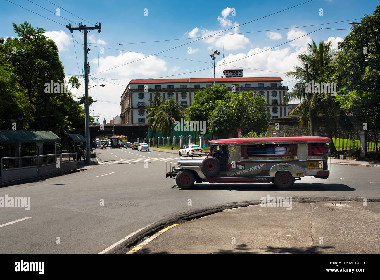 A jeepney - the very popular form of public transport in many cities in the Philippines. Modelled on the World War II jeeps. Stock Photo