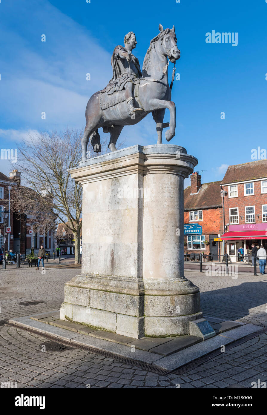 Statue of King William III on a horse on a stone plinth in the town square of Petersfield, Hampshire, England, UK. Stock Photo