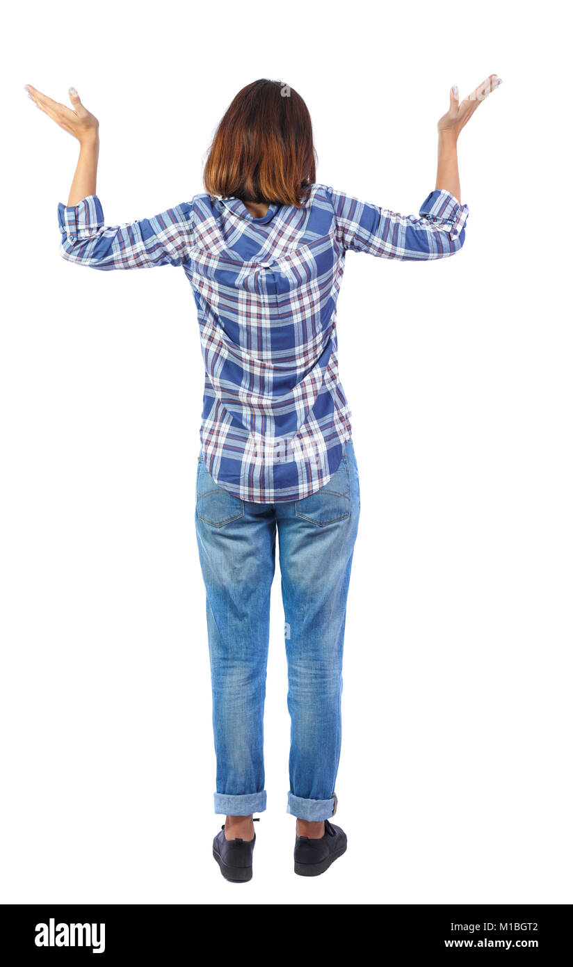 Back view of shocked woman in jeans. upset young girl. Rear view people ...