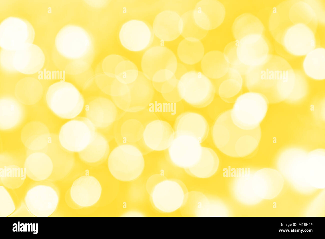 Holiday golden background with blurred bokeh lights Stock Photo - Alamy