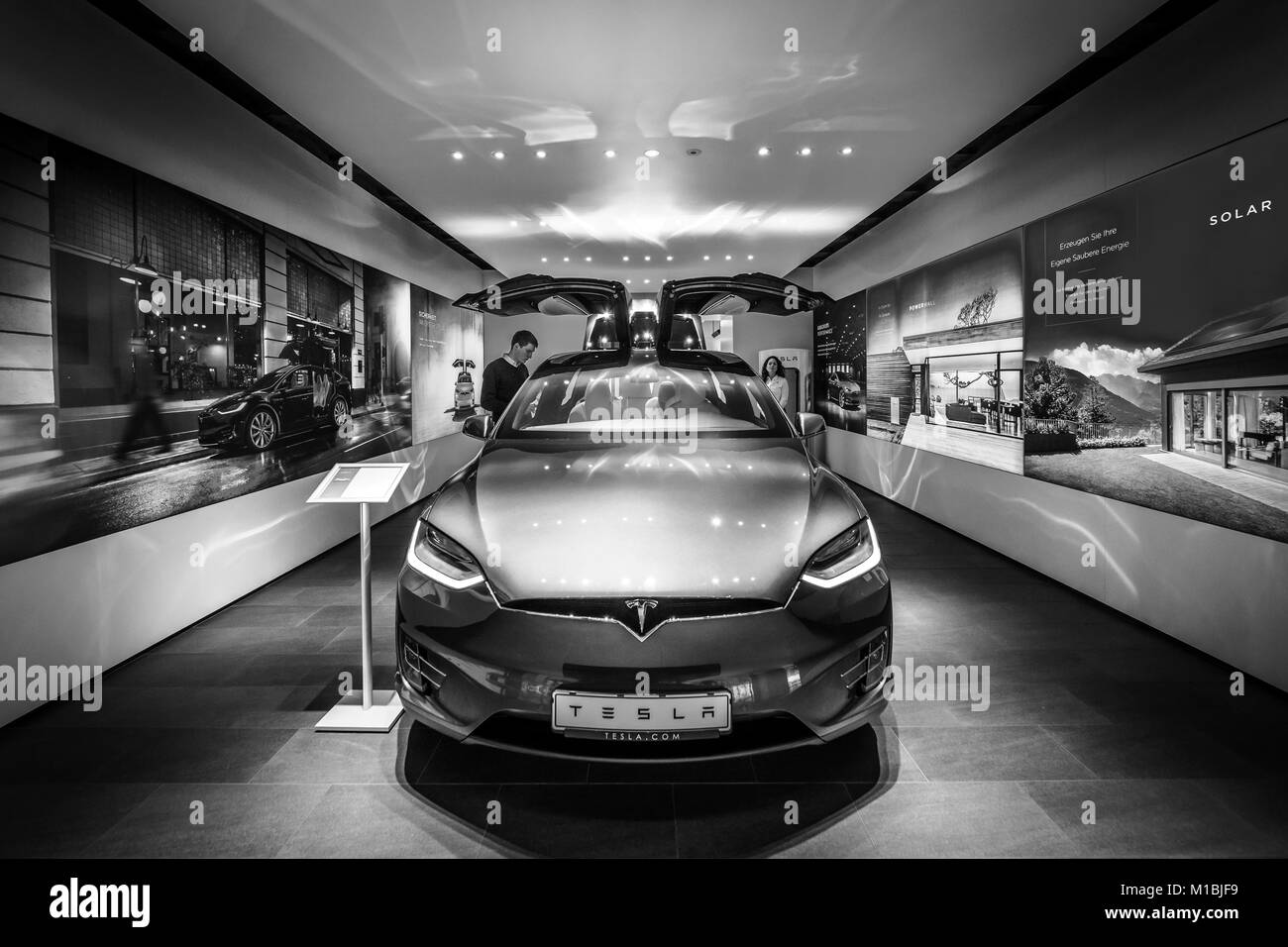 BERLIN - DECEMBER 21, 2017: Showroom. The full-sized, all-electric, luxury, crossover SUV Tesla Model X. Produced since 2016. Black and white. Stock Photo