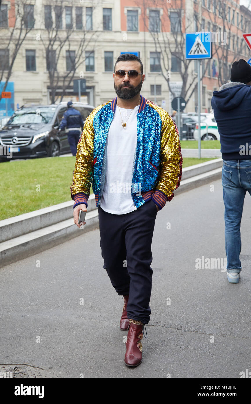 MILAN - JANUARY 15: Man with blue and yellow sequin bomber jacket before  Giorgio Armani fashion show, Milan Fashion Week street style on January 15,  2 Stock Photo - Alamy