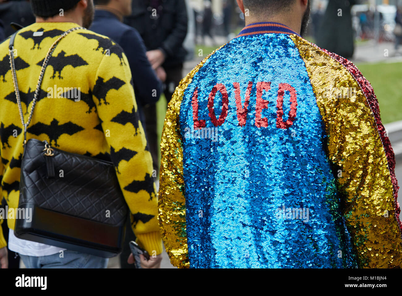 MILAN - JANUARY 15: Men with yellow and blue sequin jacket and Chanel bag  before Giorgio Armani fashion show, Milan Fashion Week street style on Janua  Stock Photo - Alamy