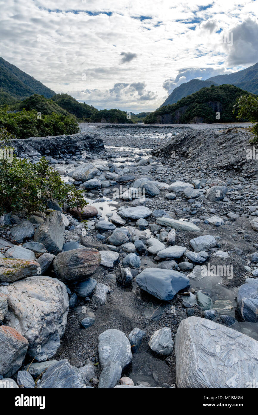 Franz Josef Glacier Walk – rock filled river Stock Photo